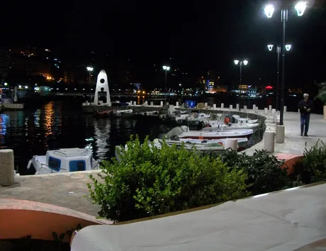 enjoying a pizza marinara and the night-time view in Sarandë